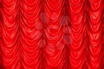 Red waving tulle curtain. Background photo texture, frontal view