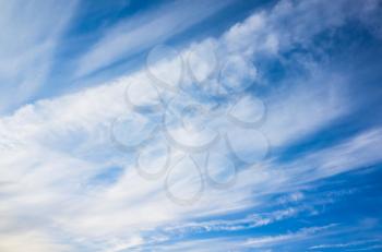 Natural cloudy sky background photo, cumulus and cirrus clouds