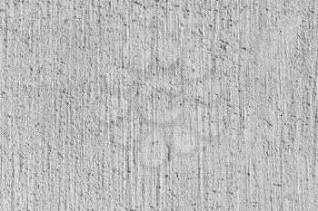 White concrete wall with relief plaster pattern. Background photo texture 