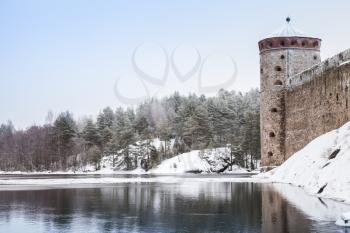 Olavinlinna is a 15th-century three-tower castle located in Savonlinna, Finland. The fortress was founded by Erik Axelsson Tott in 1475 under the name Sankt Olofsborg