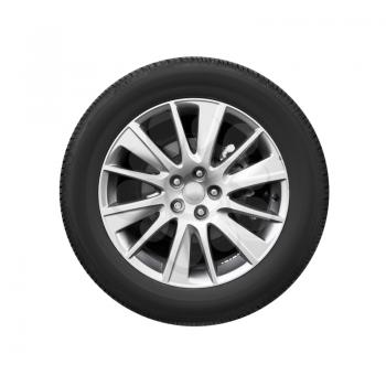 Modern car wheel on light alloy disc, front view isolated on white background