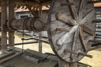 Old wooden well in Russian village, lifting gear