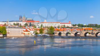 Panoramic view of Old Prague with St. Vitus Cathedral and Charles Bridge. Czech Republic landmarks