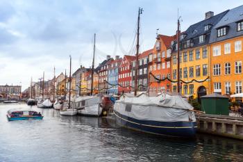 Nyhavn or New Harbour, it is a 17th-century waterfront, canal and popular touristic district in Copenhagen, Denmark