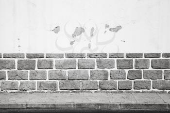 White grungy wall with gray bricks, urban interior background photo texture