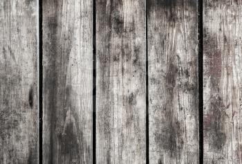 Old dark gray wooden wall, background photo texture