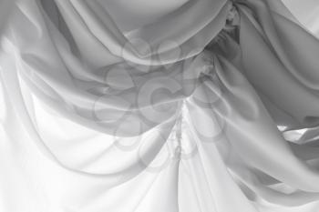 White tulle curtain with waving pattern. Background photo texture