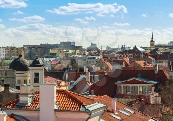 Red roofs, tubes and Church towers. Cityscape panorama of Old Tallinn, Estonia