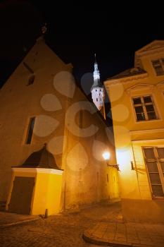 Old Tallinn, Estonia. Dark street with lights at night