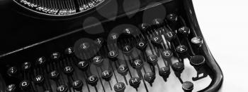 Old manual typewriter keyboard fragment,  photo with soft selective focus