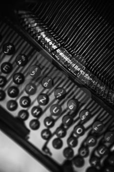 Old manual typewriter machine keyboard, top view photo with soft selective focus