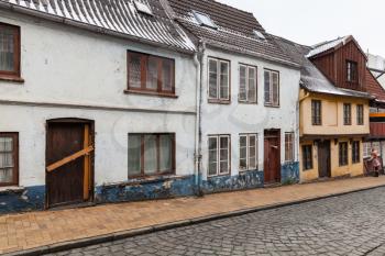 Traditional colorful living houses stand in a row in Flensburg, Germany