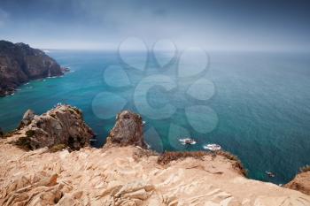 Coastal rocks of Cabo da Roca under stormy sky, Westernmost point of Europe continent