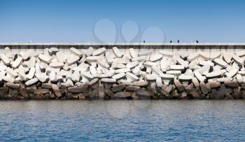 Breakwater wall made of rough concrete blocks, structure for inner port protection