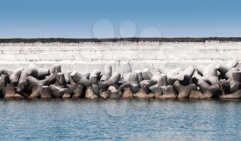 Breakwater wall with rough concrete blocks, structure for inner port protection