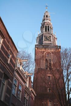 Oude Kerk, the oldest building in Amsterdam. The church was consecrated in 1306 by the bishop of Utrecht. Vertical photo