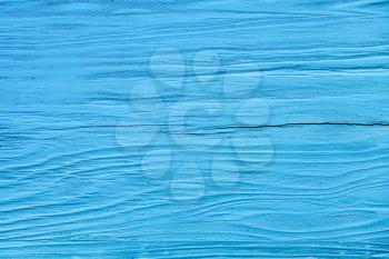 Old blue wooden wall, close-up background photo texture