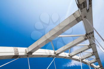 White cable-stayed bridge fragment under blue sky. Keelung, Taiwan
