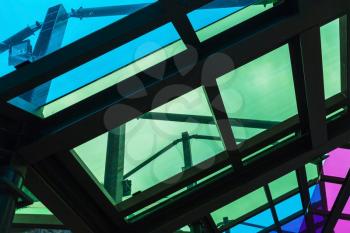 Colorful transparent roof made of glass and steel framing, abstract architecture background