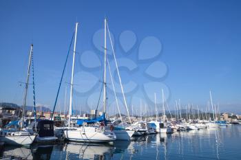 Sailing yachts and motor boats moored in marina of Ajaccio. Corsica, French island in the Mediterranean Sea