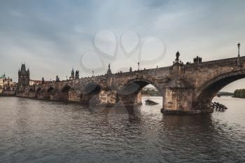 Charles Bridge over Vltava river, old Prague. Czech Republic. Vintage stylized photo with tonal filter