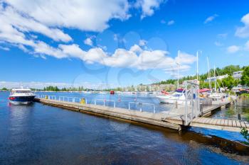 Marina with floating pier. Lappeenranta harbour in summer day, Finland