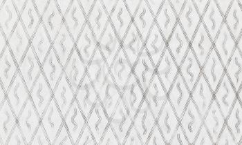 White concrete wall with decorative relief pattern, background photo texture, front view