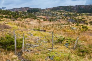 Rural Norwegian landscape with old fence, Bergen district