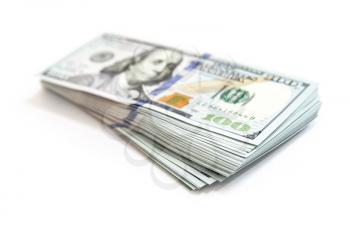 United States currency, bundle of One Hundred Dollars isolated on white background, close up photo with soft selective focus