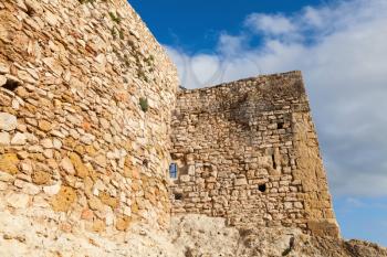 Walls of medieval stone castle. Main landmark of Calafell, Spain