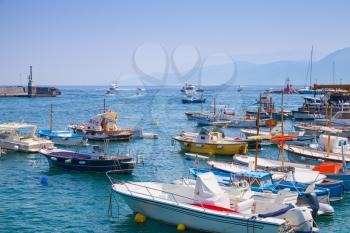 Moored pleasure motorboats in port of Capri island, Italy
