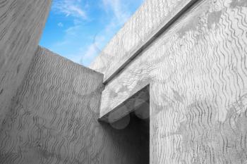 Abstract modern gray concrete architecture fragment with sky