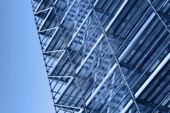 Modern metal scaffolding, blue toned photo