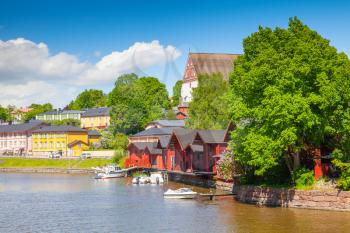 Historical Finnish town Porvoo. Old red wooden houses on the river coast