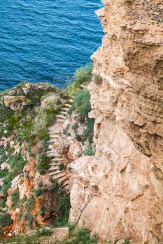 Coastal cliff with old stone stairway. Bulgaria, Black Sea Coast, Kaliakra headland