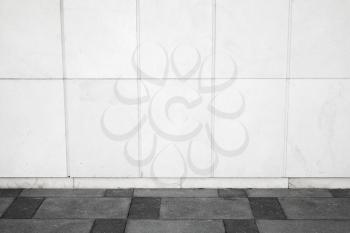 Abstract white urban background interior with tiling on the wall and road pavement