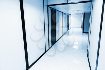 Abstract empty white office interior. Blue toned photo