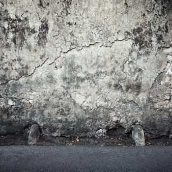 Empty square Interior background texture with dark ancient gray stone wall and asphalt