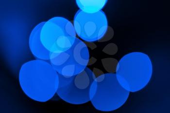 Defocused lights blue abstract background. Photo bokeh patten.