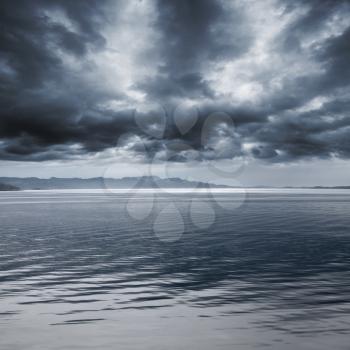 Dark blue rainy marine landscape. Stormy Norwegian Sea