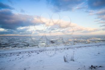 Winter coastal landscape with floating ice near by the coast of the Gulf of Finland