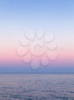 Evening sky natural colorful gradient over the sea water, abstract empty background