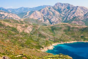 Coastal landscape of French Mediterranean island Corsica. Corse-du-Sud, Piana region. Mountains, sea and summer beach