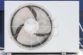 Closeup photo of white outer air conditioner device