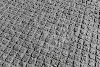 Background photo texture. Granite cobblestone road pavement pattern