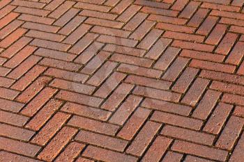 Red brick road pavement, abstract background texture