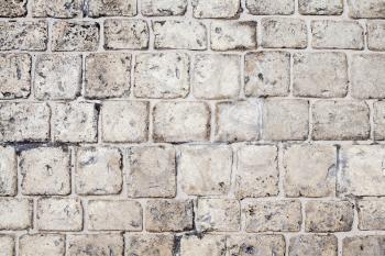 Gray stone floor pavement, frontal background photo texture