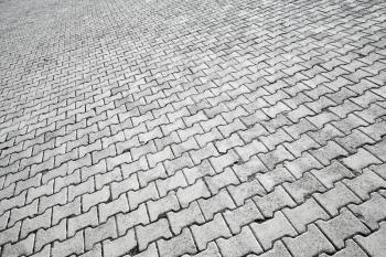 Abstract urban background texture of modern gray cobblestone road pavement