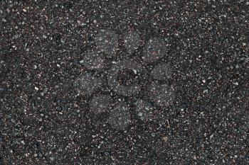 Black asphalt pavement closeup background photo texture