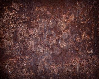 Rusted dark brown metal wall detailed photo texture